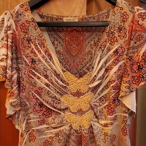 Beautiful top with butterfly detail